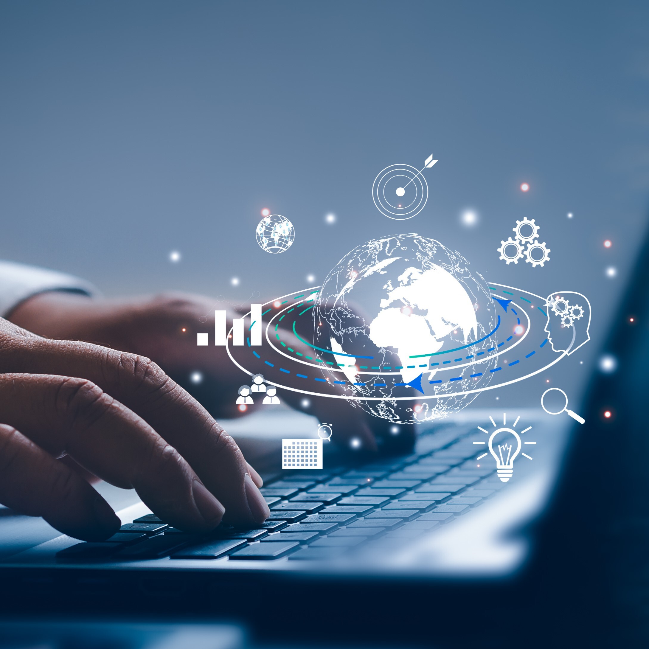 Hands typing on a laptop keyboard with superimposed digital icons including a globe, bar graphs, gears, light bulb, magnifying glass, calendar, and network nodes, representing global connectivity, innovation, and data integration.